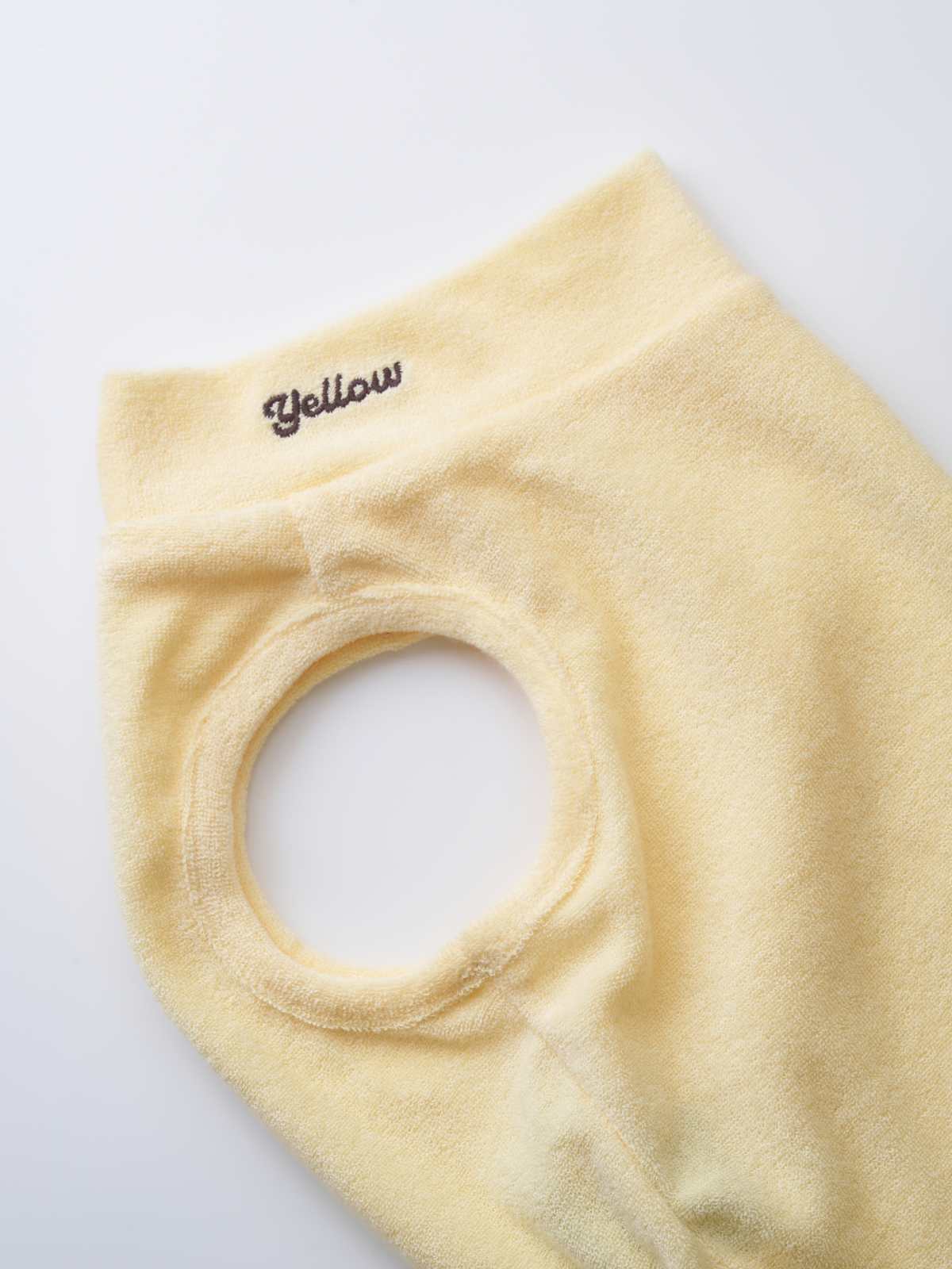Close-up of the butter Soft Terry Tank neckline and arm opening