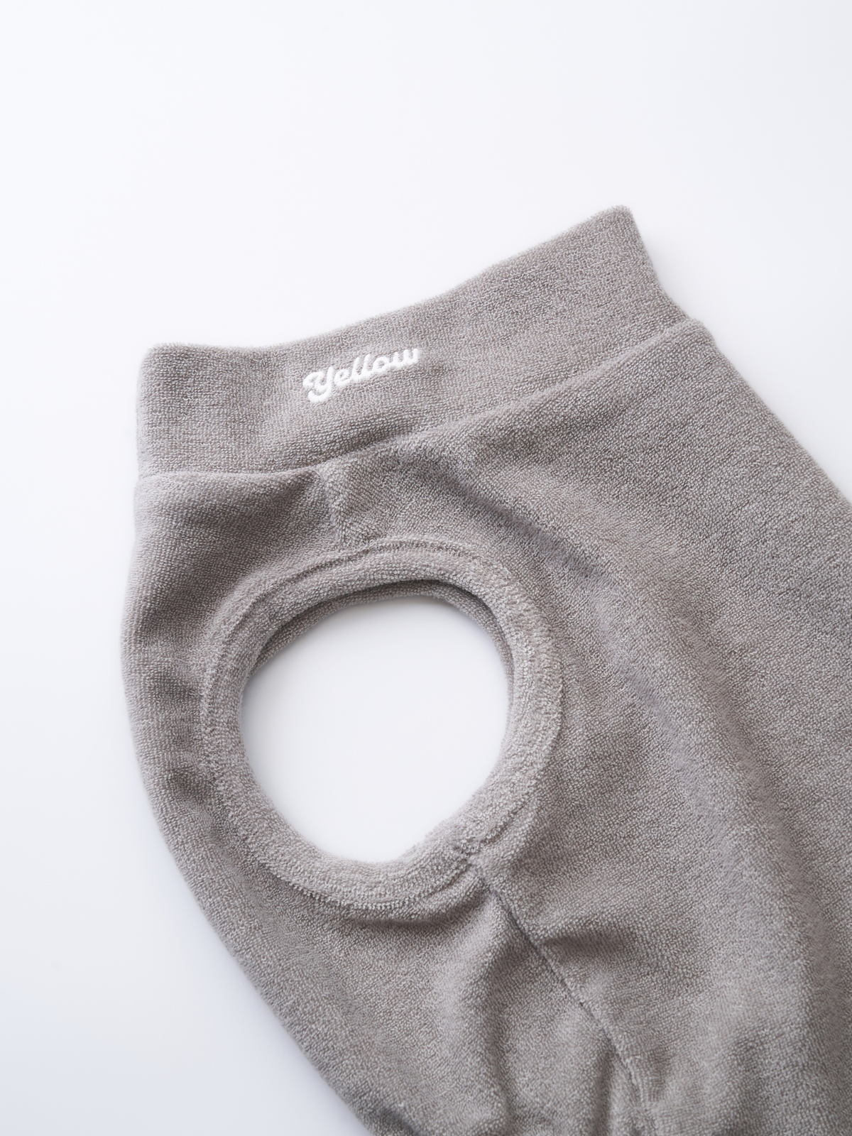 Close-up of the moss grey Soft Terry Tank neckline and arm opening