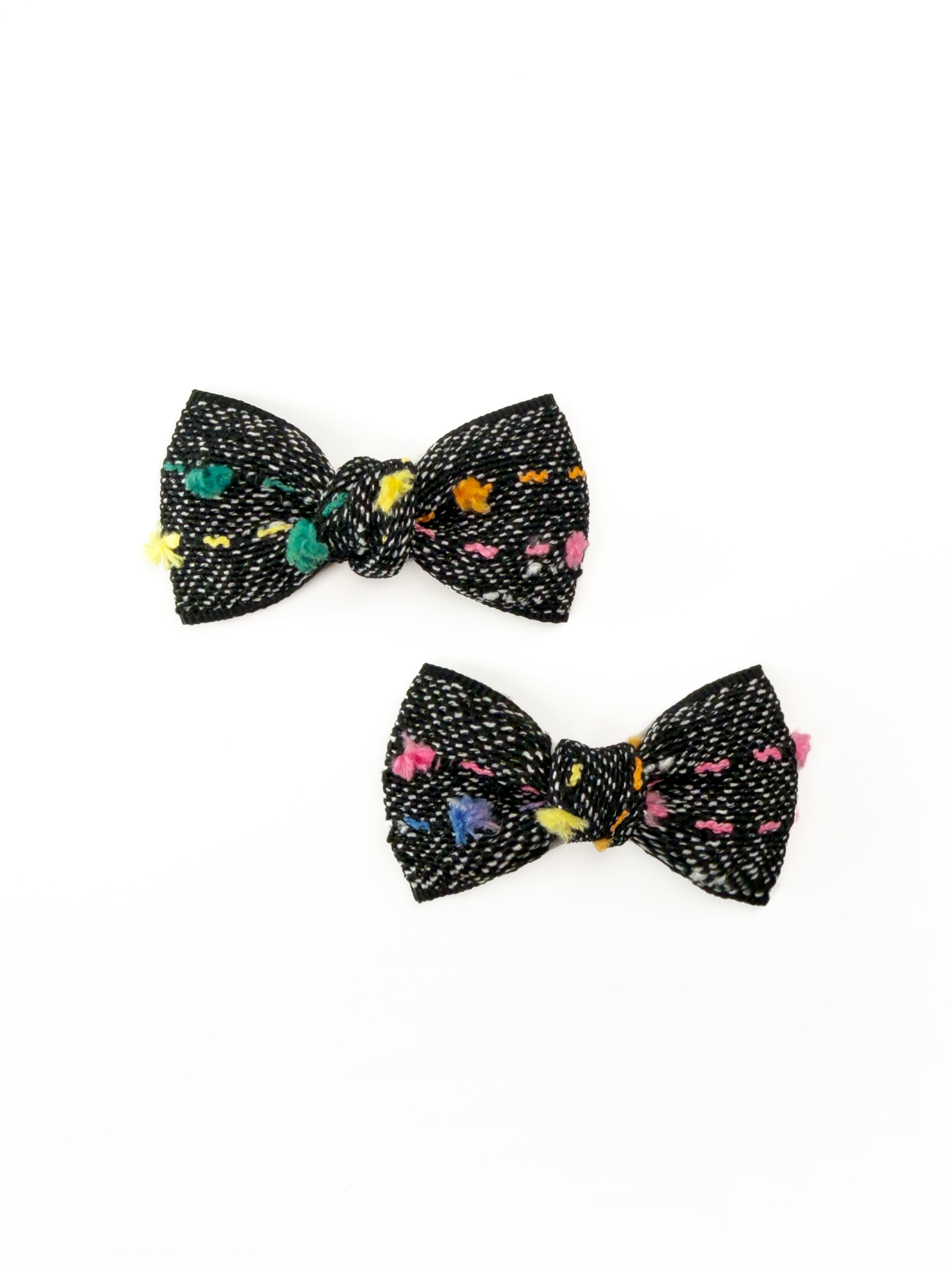 Pair of BALOVESYOU Crayon Confetti pet hair clips with playful multicolored patterns.