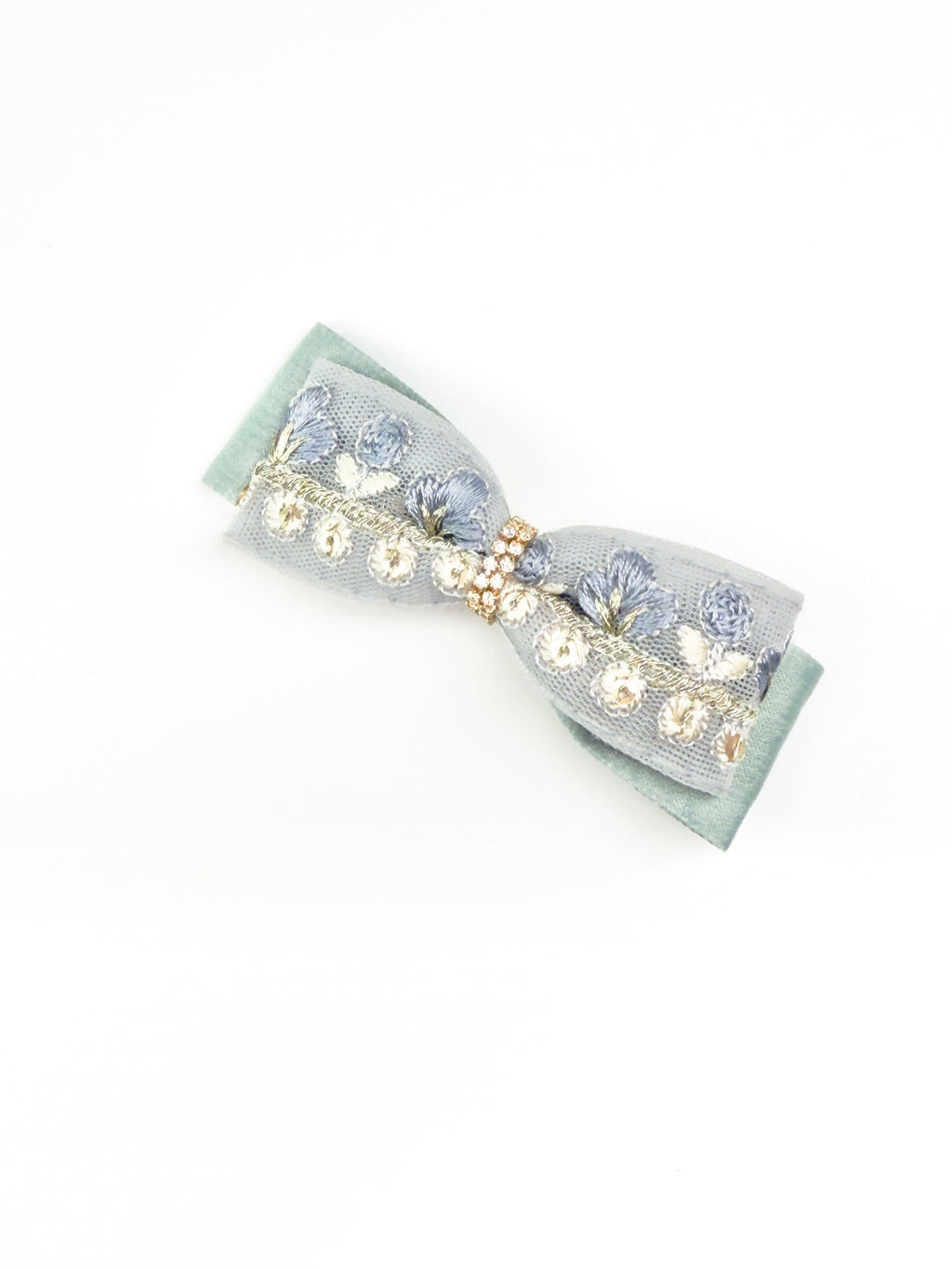 Angled view of the BALOVESYOU Dawn Shimmer pet hair clip with delicate pearl and floral details.