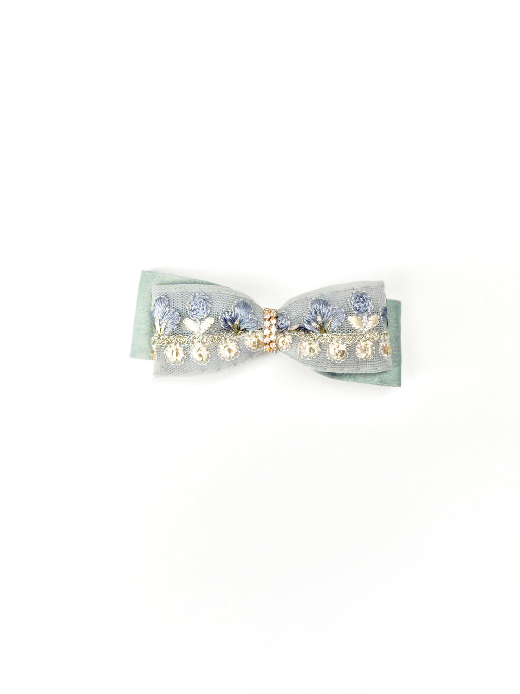 BALOVESYOU Dawn Shimmer pet hair clip with a pale blue bow, pearl embellishments, and soft layered details.