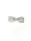 BALOVESYOU Dawn Shimmer pet hair clip with a pale blue bow, pearl embellishments, and soft layered details.