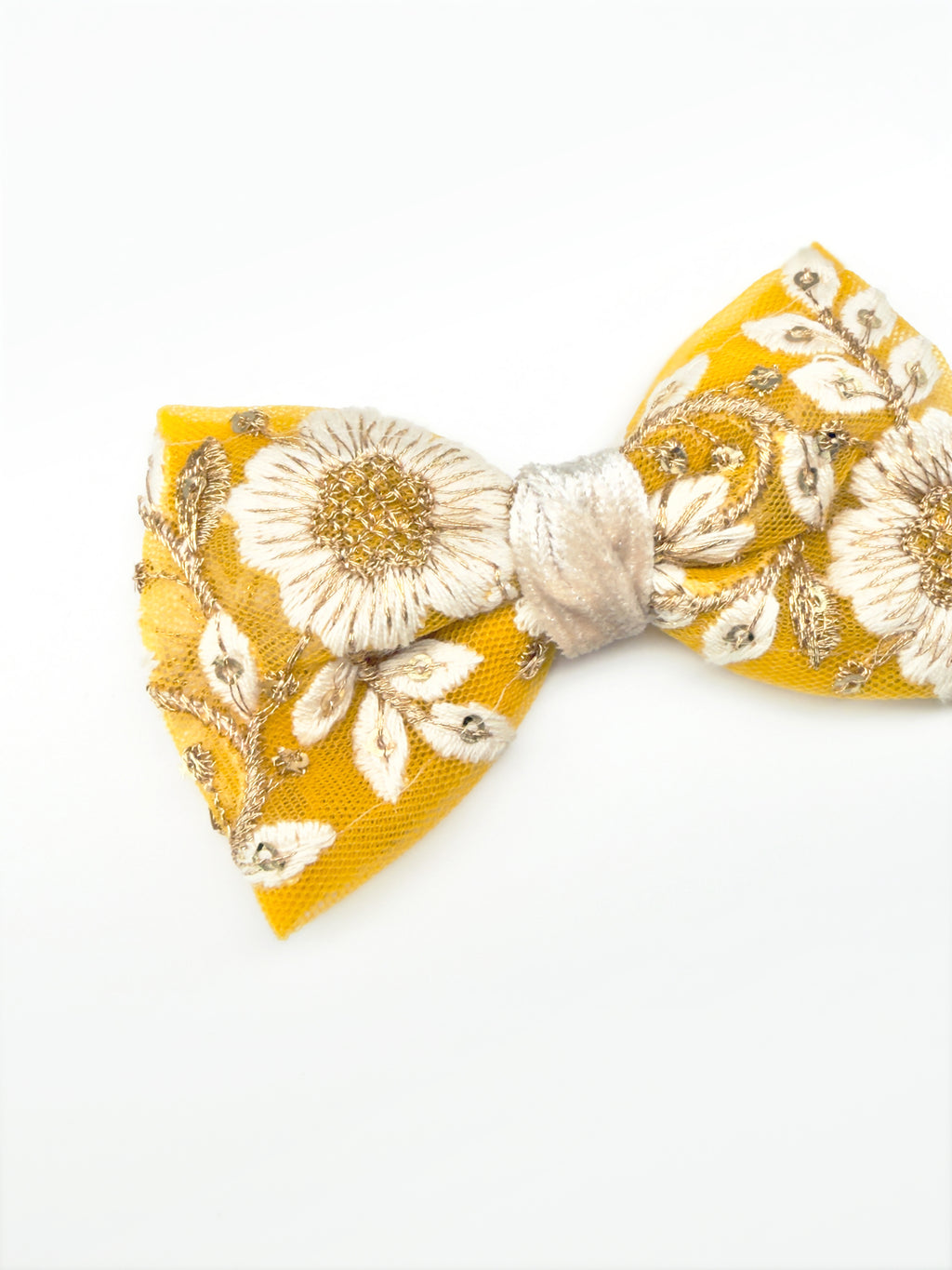 Close-up of the BALOVESYOU Jardin Baroque pet hair clip in Velvet with floral fabric and layered embellishments.