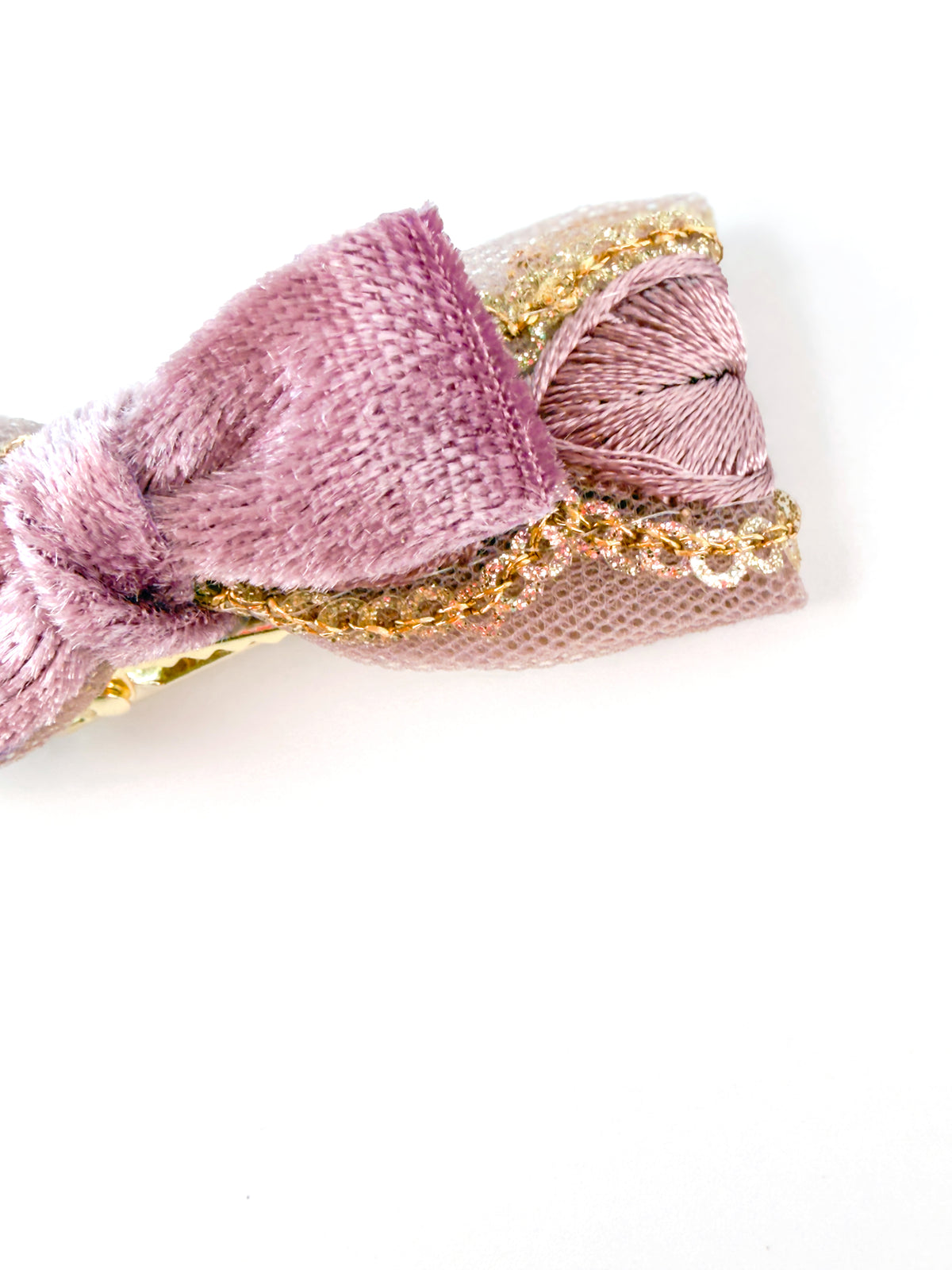 Angled view of the BALOVESYOU Smoky Rose pet hair clip with pink fabric and lace edges.