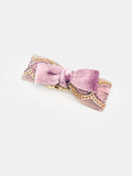 Flat lay of the BALOVESYOU Smoky Rose pet hair clip.