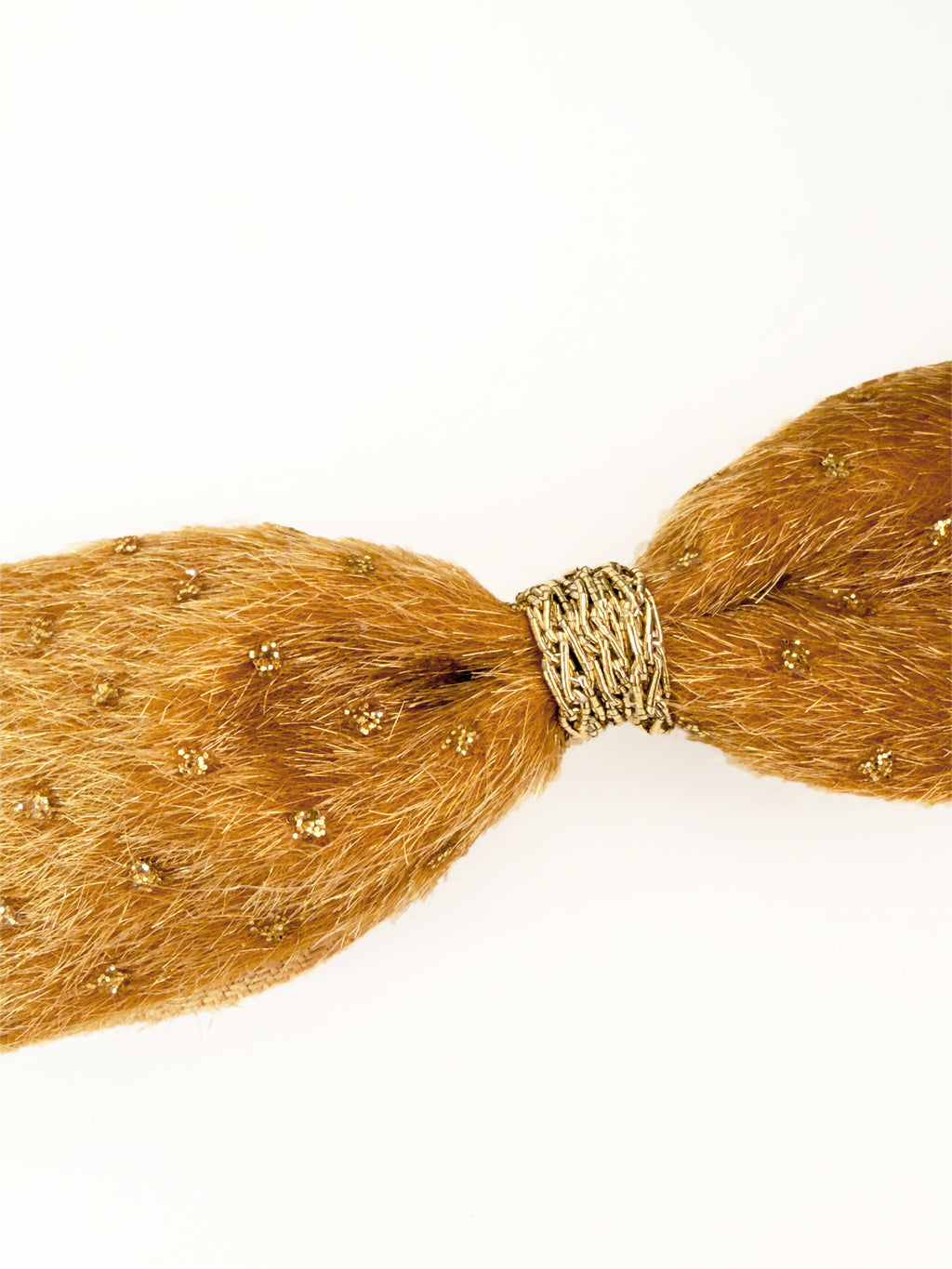 Close-up of the BALOVESYOU Stardust pet hair clip in Gold, showing its textured fabric and subtle sparkle.