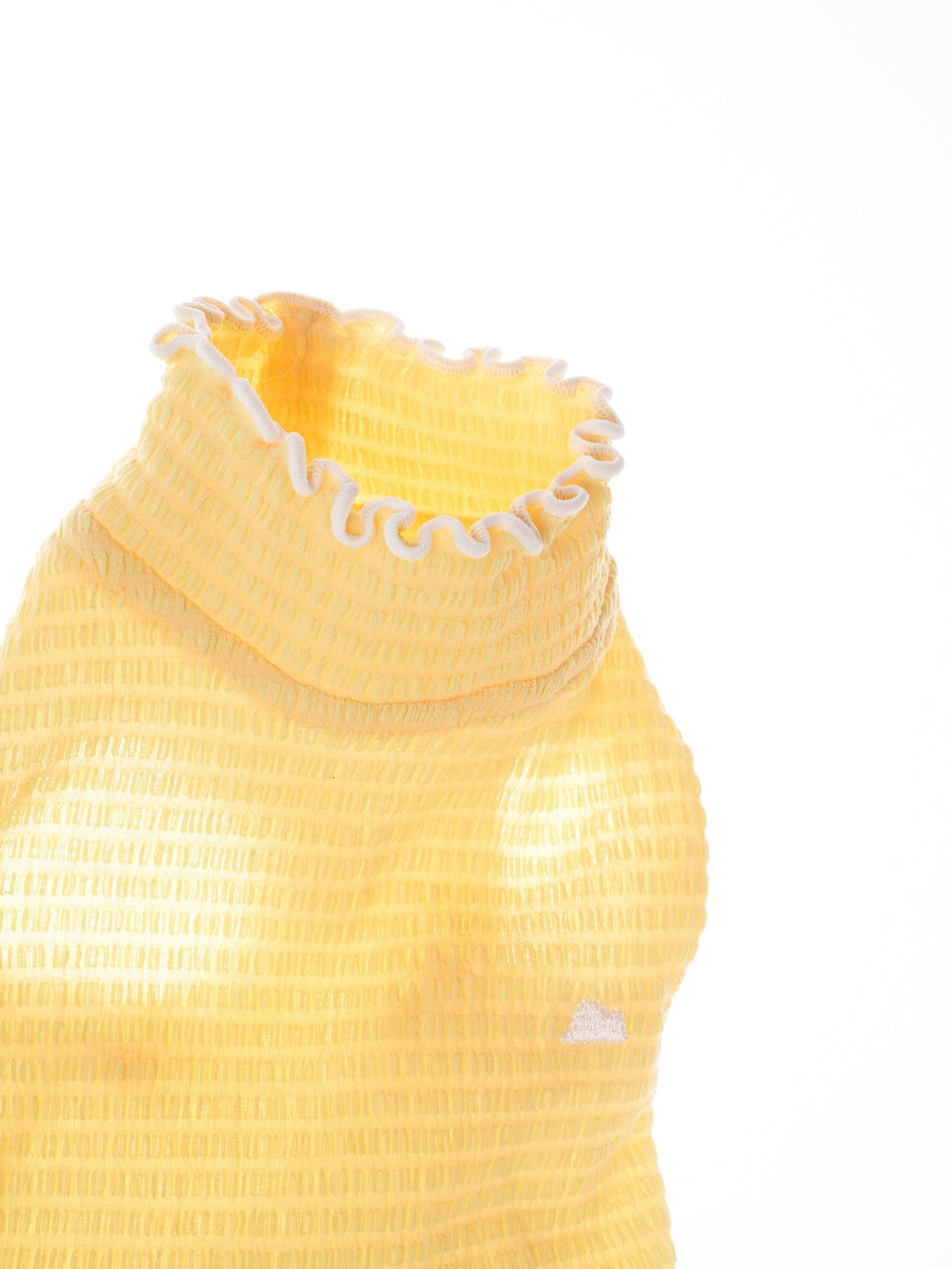 Close-up of the Pale Yellow wavy textured fabric on the Colorful Daily AIRWave Tank.