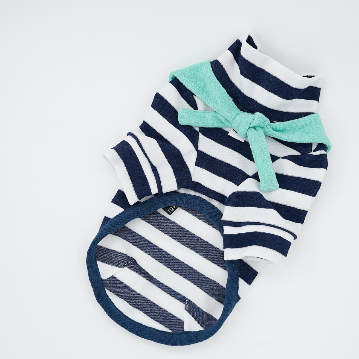 Flat lay of Colorful Daily Series Classic Stripe two-leg pet outfit in navy blue with a green yarn-dyed bandana on white background
