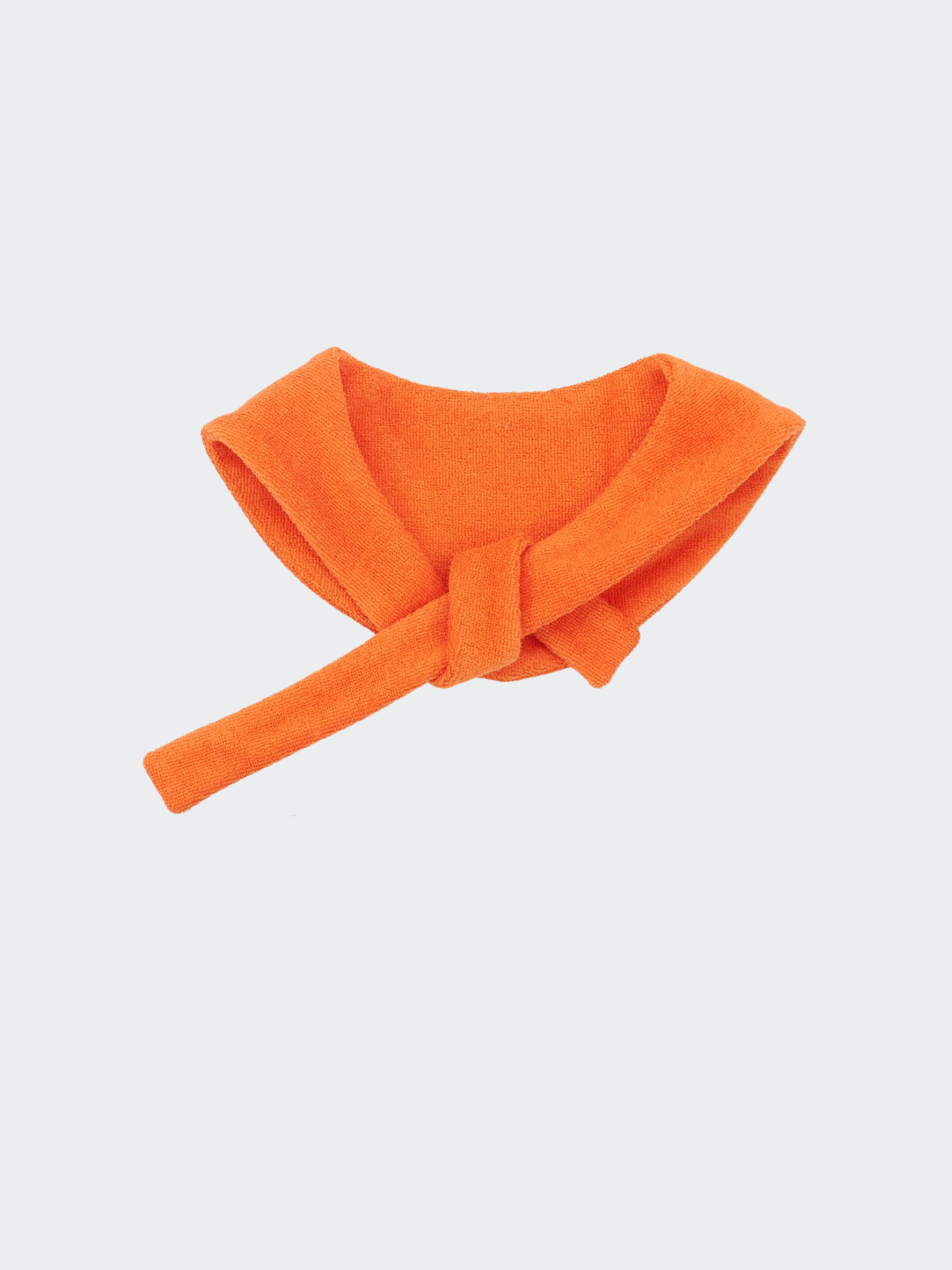 Colorful Daily Series color yarn-dyed pet bandana in bright orange, flat lay on white background