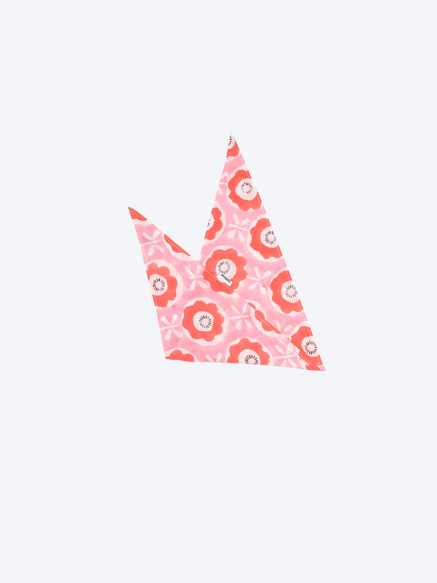 Doodled Poppy block print Indian cotton bandana folded into a triangle on a white background