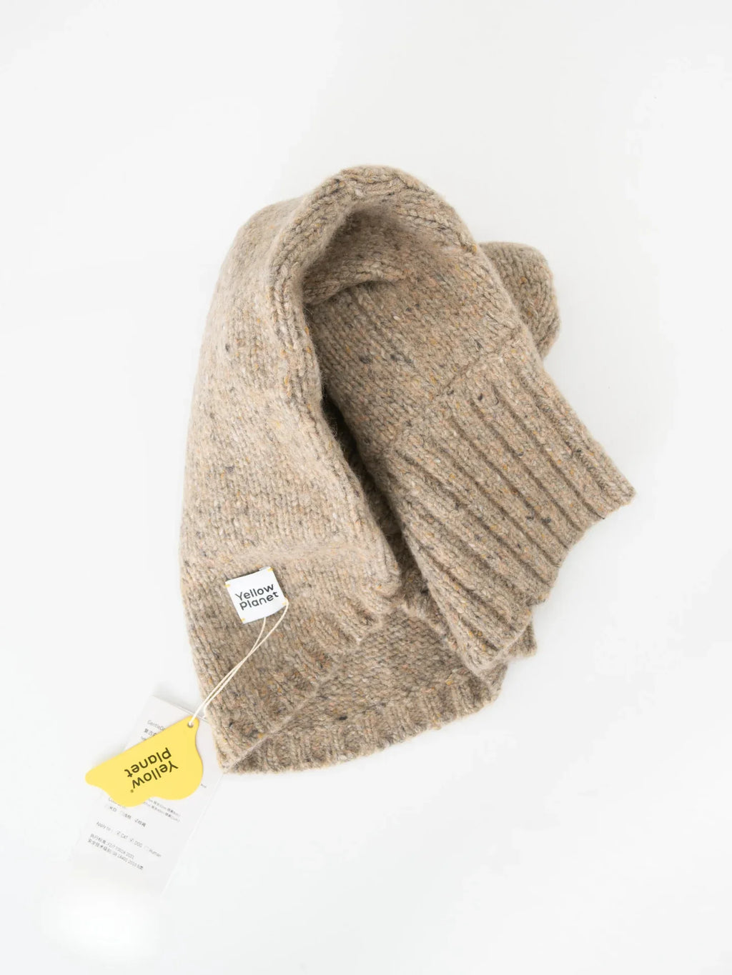 A top-down view of the folded Walnut Tweed pet sweater showcasing the soft, dense alpaca and wool knit.