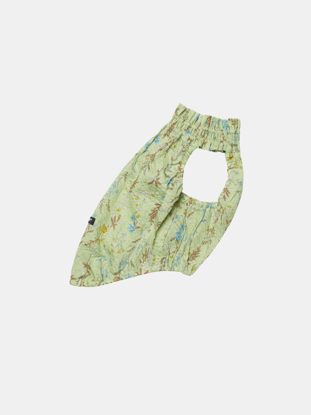 Side view of the Colorful Daily Nature's Verse Gentle Wave Tank in Forest Green, showing the lightweight silhouette and botanical printed fabric.