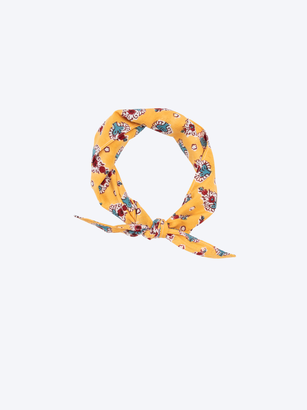 Mughal Grace block print Indian cotton bandana rolled and knotted as a scarf on a white background