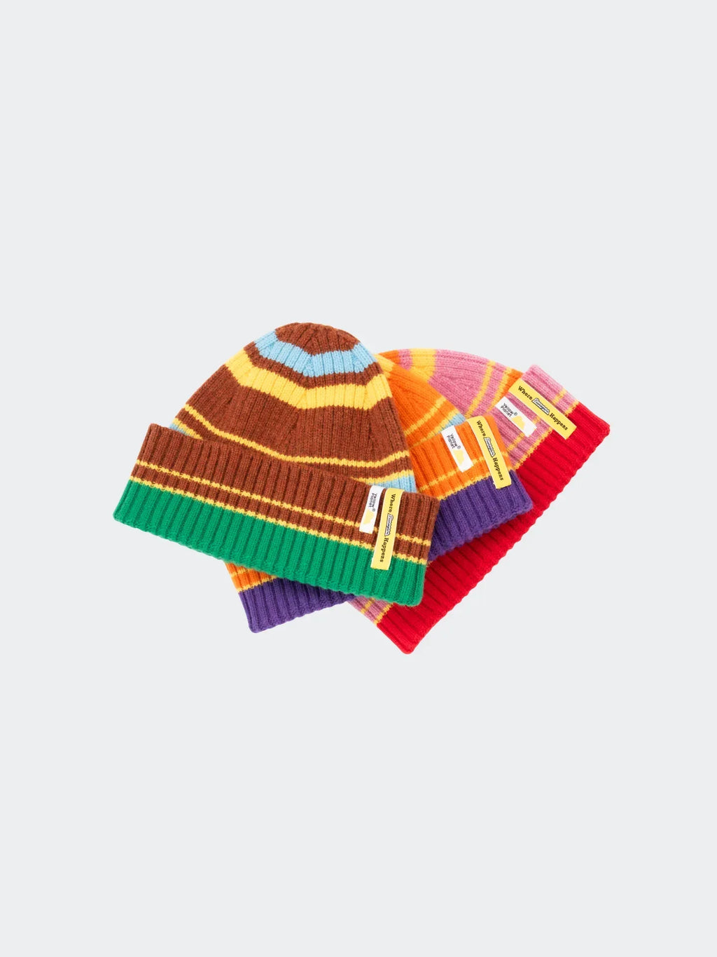 A group shot of the Color Heal Series beanies in Pink and Chestnut Brown stripes, highlighting the collection's diverse palette.