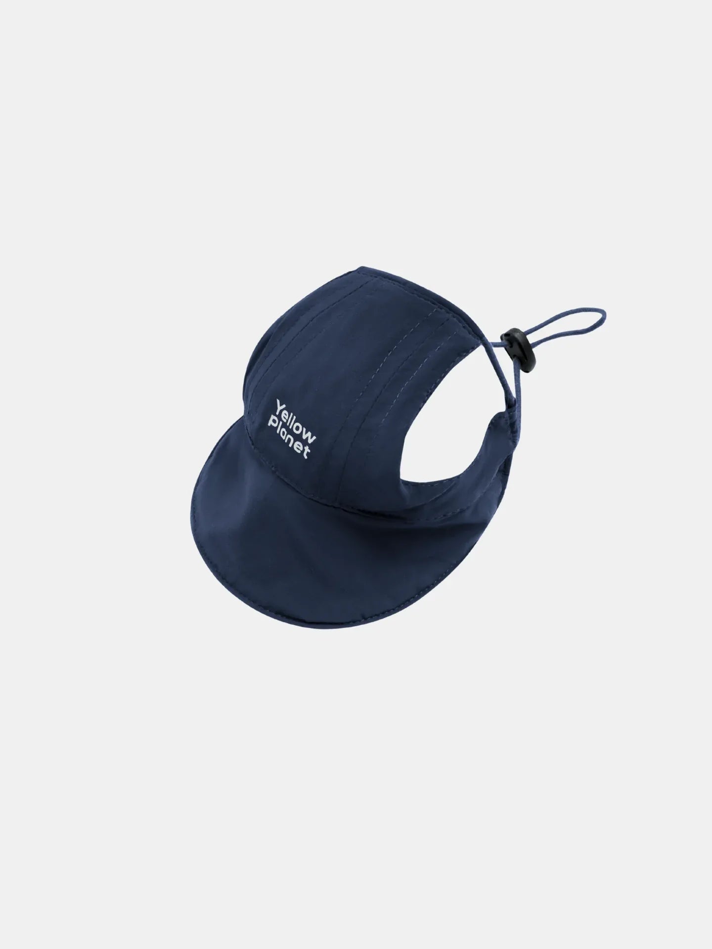 Profile view of the Oasis Series pet cap in Navy blue, showing the adjustable toggle strap and "Yellow Planet" logo.