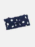 Oasis Polka Dot Bow Neckpiece in Navy with white polka dots and a soft bow, inspired by vintage European collar styling.