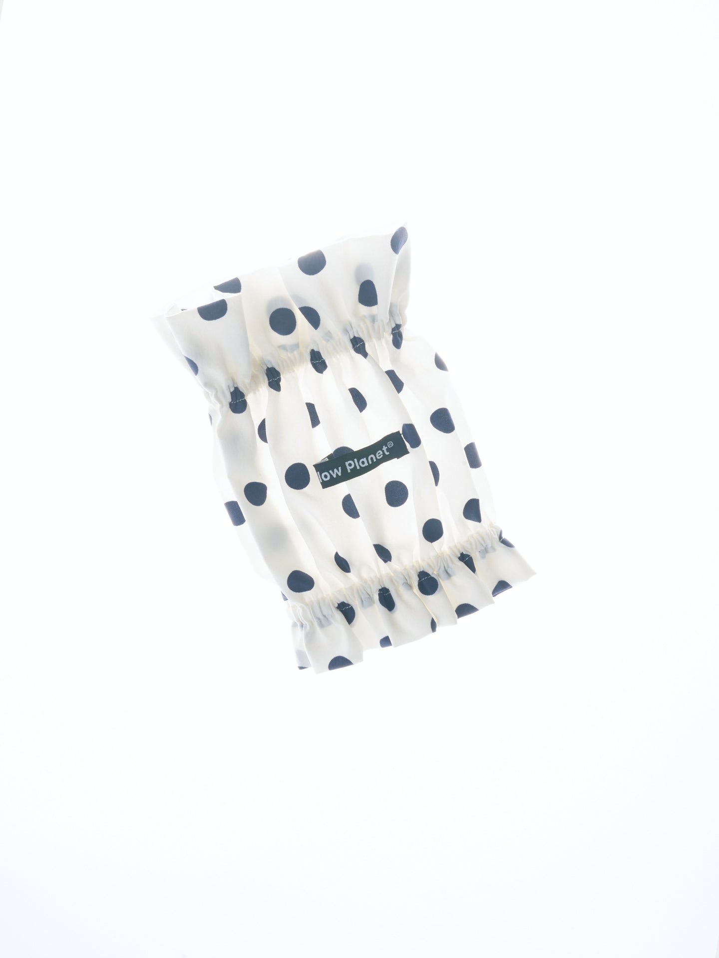 Detail of the Oasis White polka dot dog ear snood, showing its softly rounded shape and secure fit for long-eared dogs.