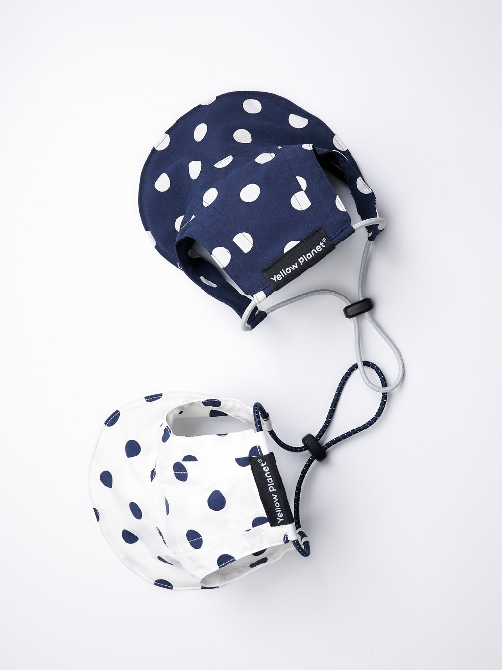 Oasis Series Polka Dot UV Pet Caps in Navy and White, showing the two available color options.