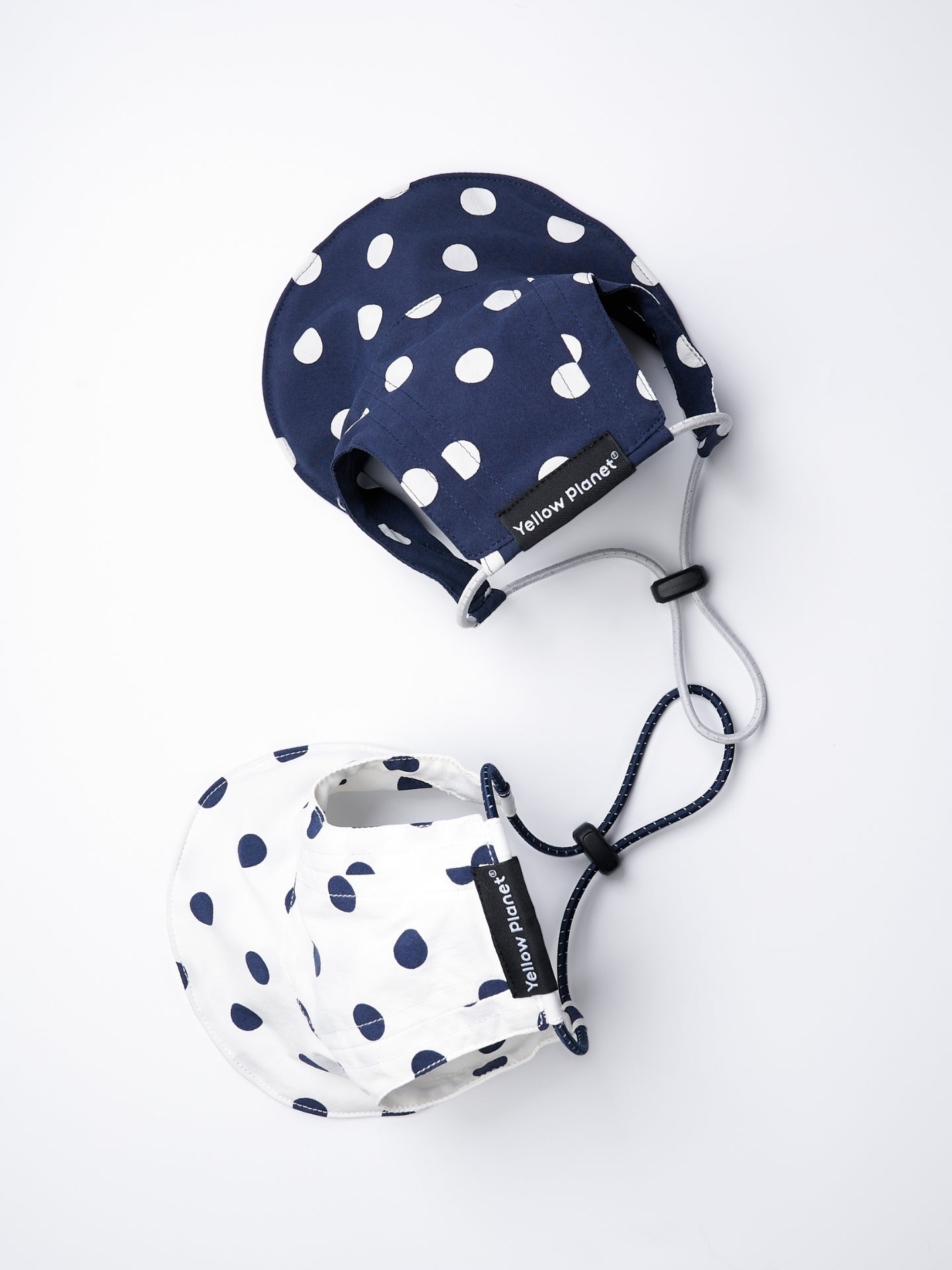 Oasis Series Polka Dot UV Pet Caps in Navy and White, showing the two available color options.