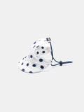 Side view of the Oasis Series Polka Dot UV Pet Cap in White with an adjustable brim and reflective elastic cord.