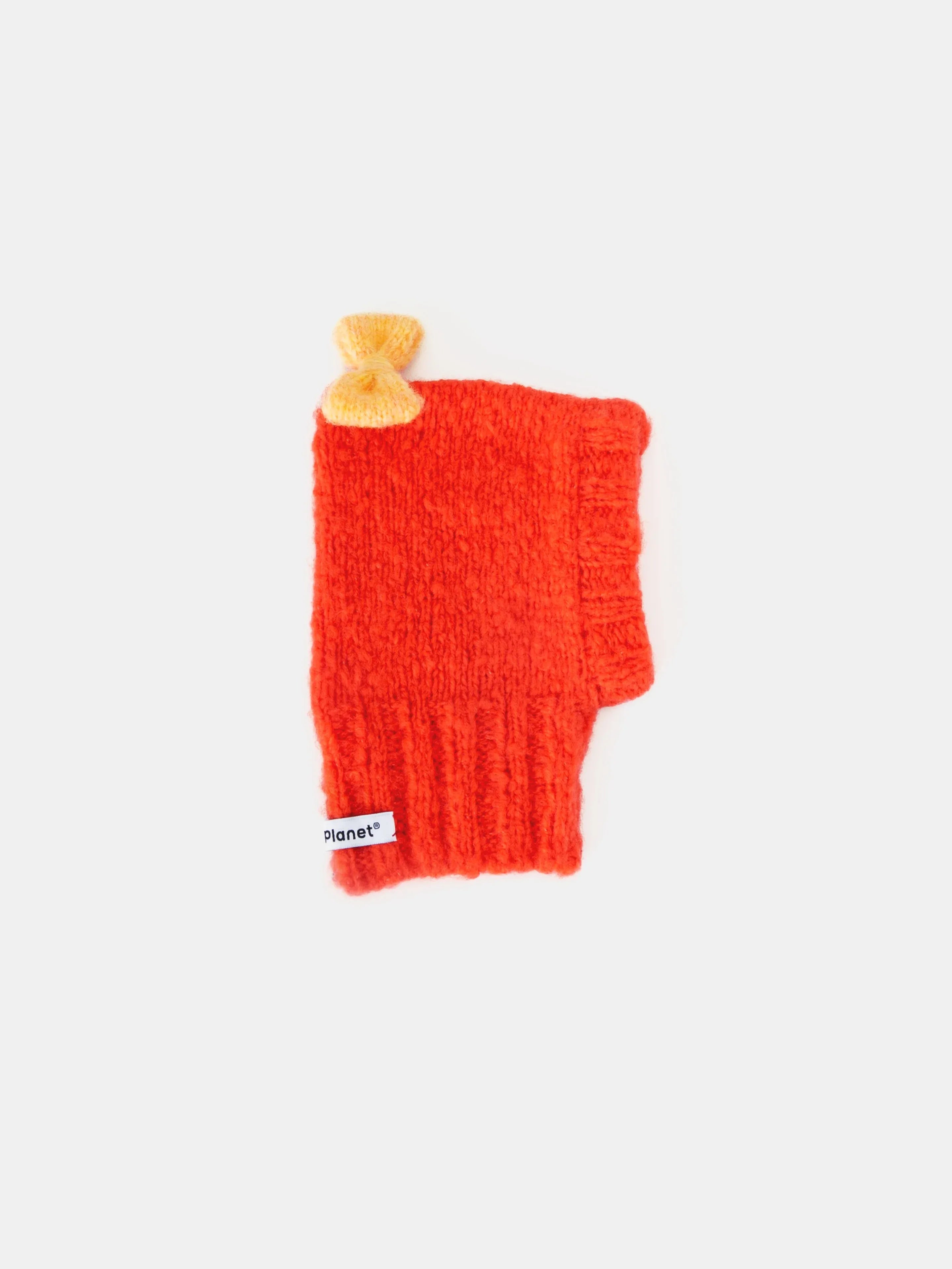 Main product view of the Persimmon Red "Mochi BonBon" hand-knitted pet beanie featuring a fuzzy wool texture and a warm yellow bow.