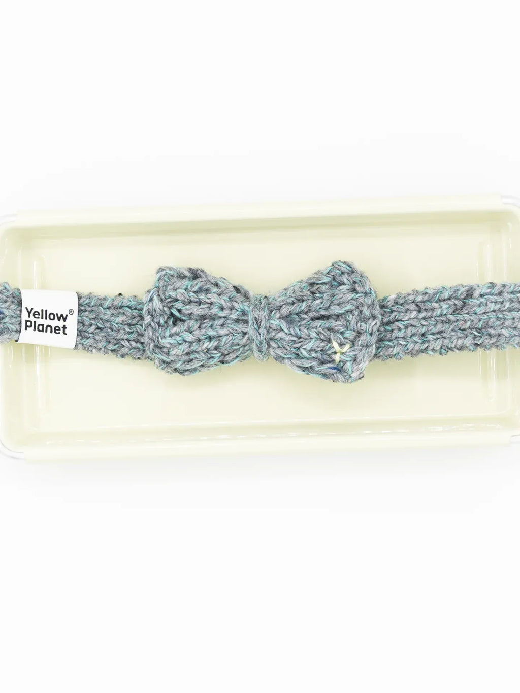Top-down view of the Sage Tweed pet bow tie showcasing the soft, adjustable knitted strap for a comfortable fit.