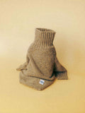 Main product view of the Walnut Tweed alpaca-wool dog sweater featuring a thick ribbed high-neck design.